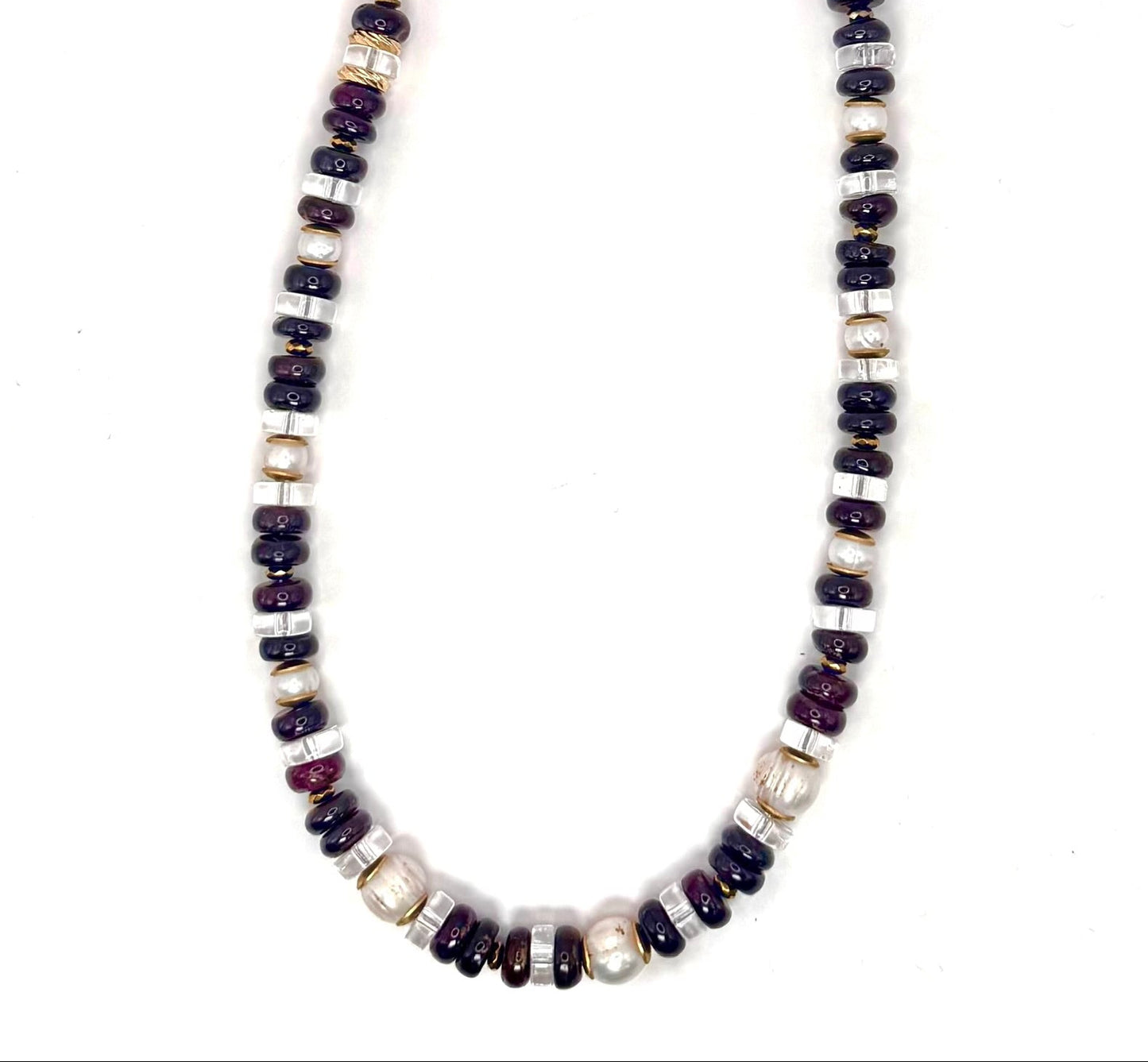 Beaded necklace with garnet and fresh water beads on a white background