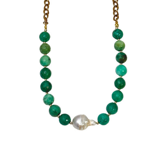 Necklace with green beads and a pearl on a white background