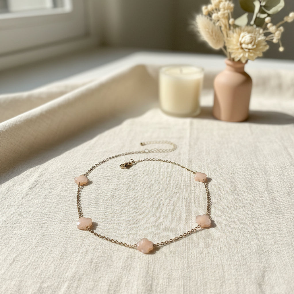 Necklace with shell-like beads on a light background