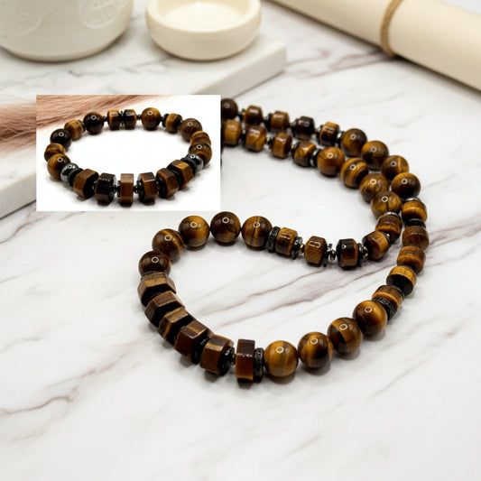 Tiger eye beaded necklace and bracelet on a white background